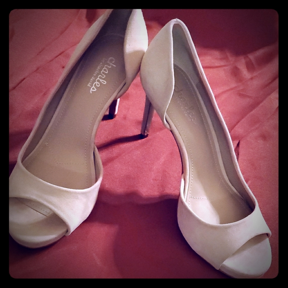 Pink open toe pumps
